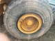 Volvo L150E Left/Driver Tire and Rim - Used | P/N VOE11024139