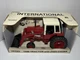 ERTL 1586 INTERNATIONAL TRACTOR WITH ENDLOADER AND CAB 1:16 DIECAST