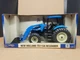 Ertl New Holland TS115A Tractor w 56LB Loader 1/16 #13620 60th Anniversary 2005