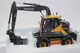 AT Collection 3200100 Volvo EWR 150 E Mobile Excavator 1:32 Nokian Tires NEW OVP
