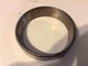 70555360 - A New Wheel Hub Cup For A New Idea 5212 Disc Mower Conditioners.