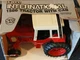 NIB ERTL International 1586 Tractor With Cab