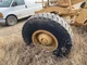 Galion T600B Left/Driver Tire and Rim - Used | P/N AG63336
