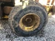 Komatsu WA180-3PT Left/Driver Tire and Rim - Used
